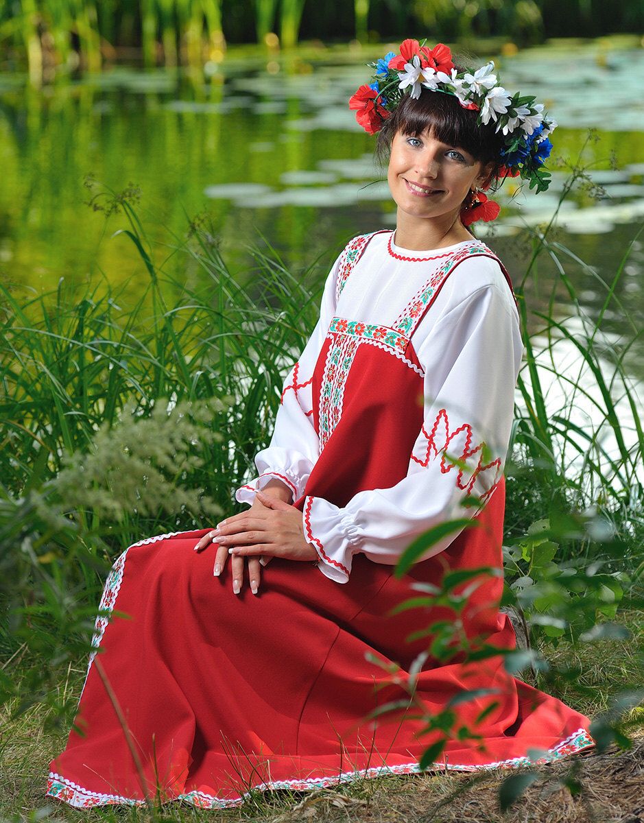 Beautiful girl Girls in Slavic costumes in Santiago de los Trainta Caballeros